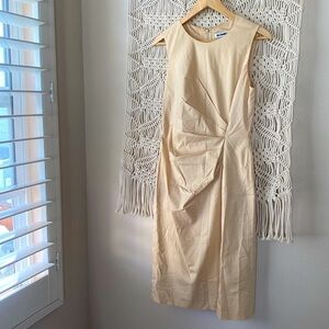 Jil Sander Designer midi dress in a eggshell cream color, fitted cockta…